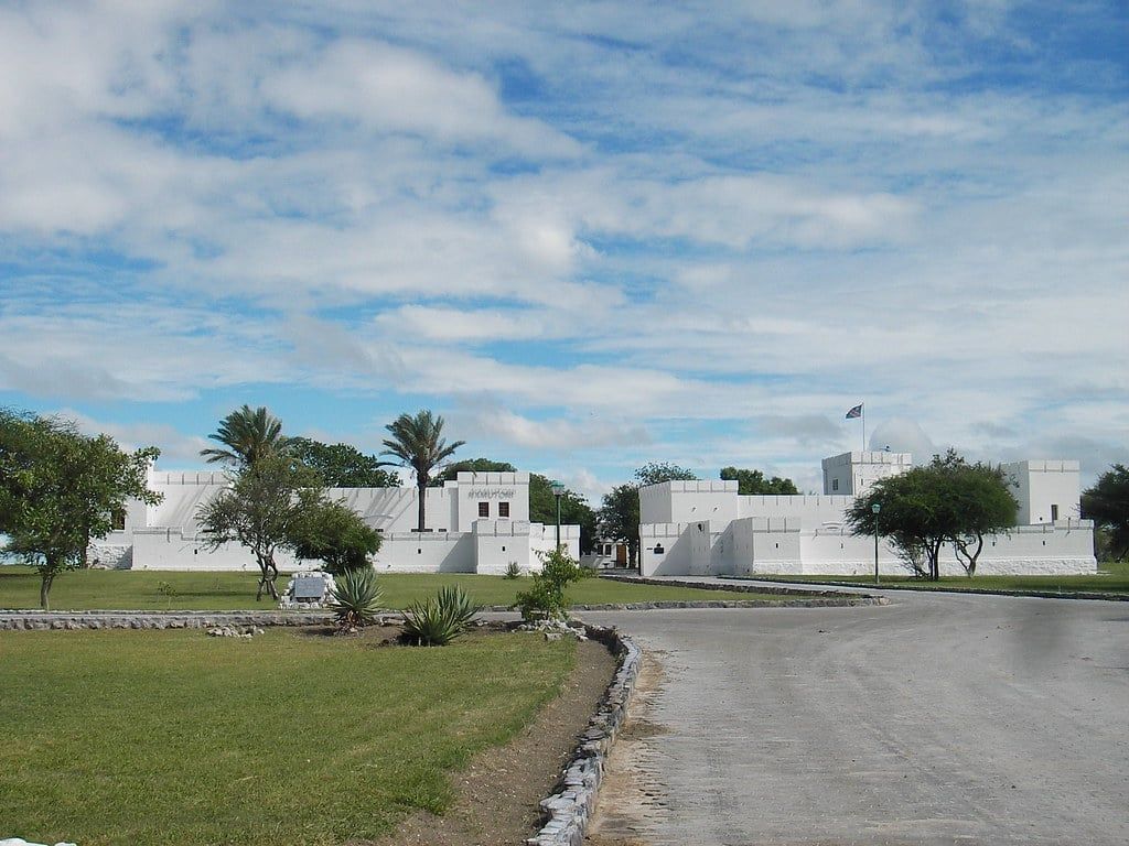 The whitewashed walls and towers of the historic German fort at Namutoni Camp in Etosha National Park.